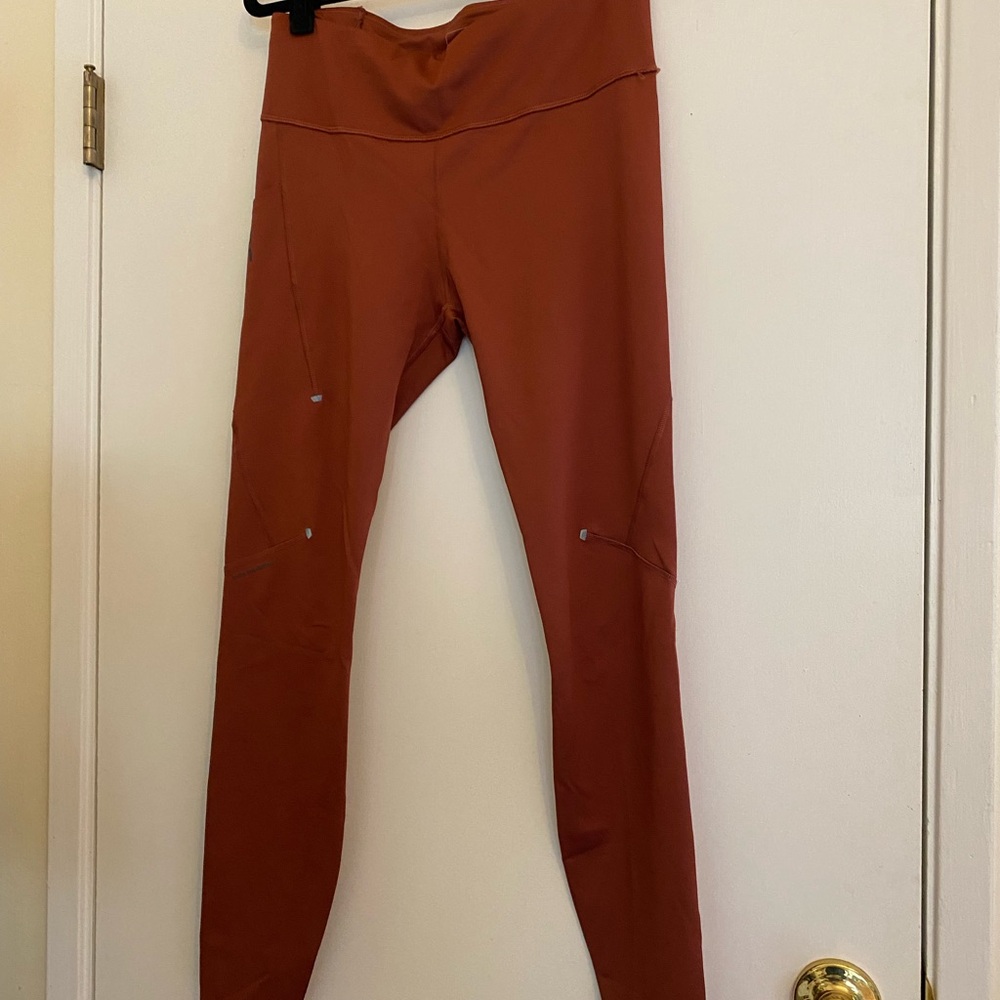 On Running Women's Performance Leggings in Rust